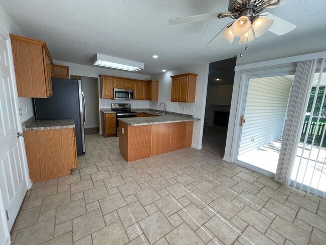 Building Photo - Spacious 4BR Home in Seven Oaks with Garage & Private Yard