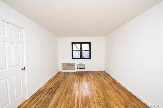 Building Photo - 94-30-94-60 60th Ave