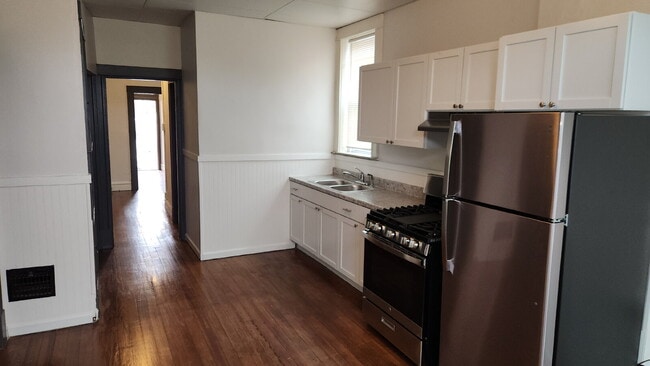 Building Photo - Elegant Two-Bedroom Duplex Retreat in the Heart of St. Louis