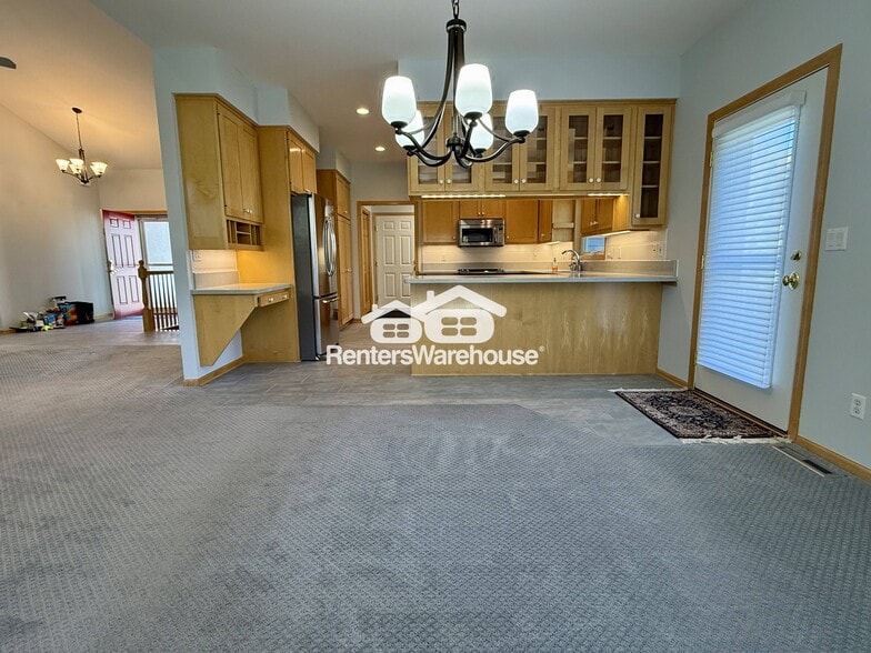 Building Photo - 9536 Windflower Pl N