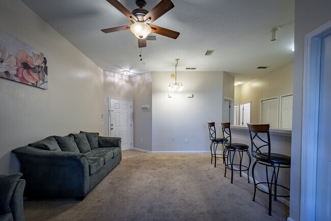 Building Photo - Spacious 2BR/2BA Condo – First Floor, Gate...