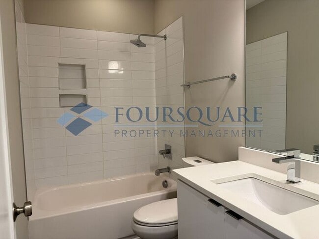Building Photo - Beautiful  3-Bed / 3.5-Bath End-Unit Townhome with Rooftop Patio, Skyline Views & Climate-Control...