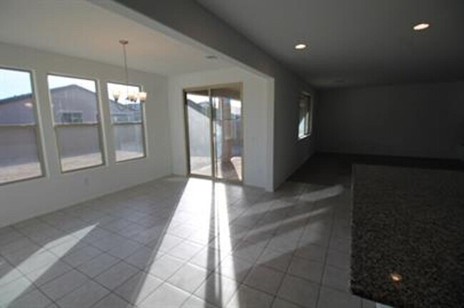 Building Photo - STUNNING 4-Bedroom + Den Home in Gladden Farms!!!!! SOLAR PANELS!!!