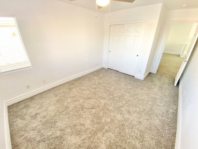 Building Photo - STUNNING 2 STORY HOME IN A GUARD GATED COM...