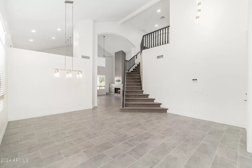 Entrance with staircase - 6739 E Gelding Dr
