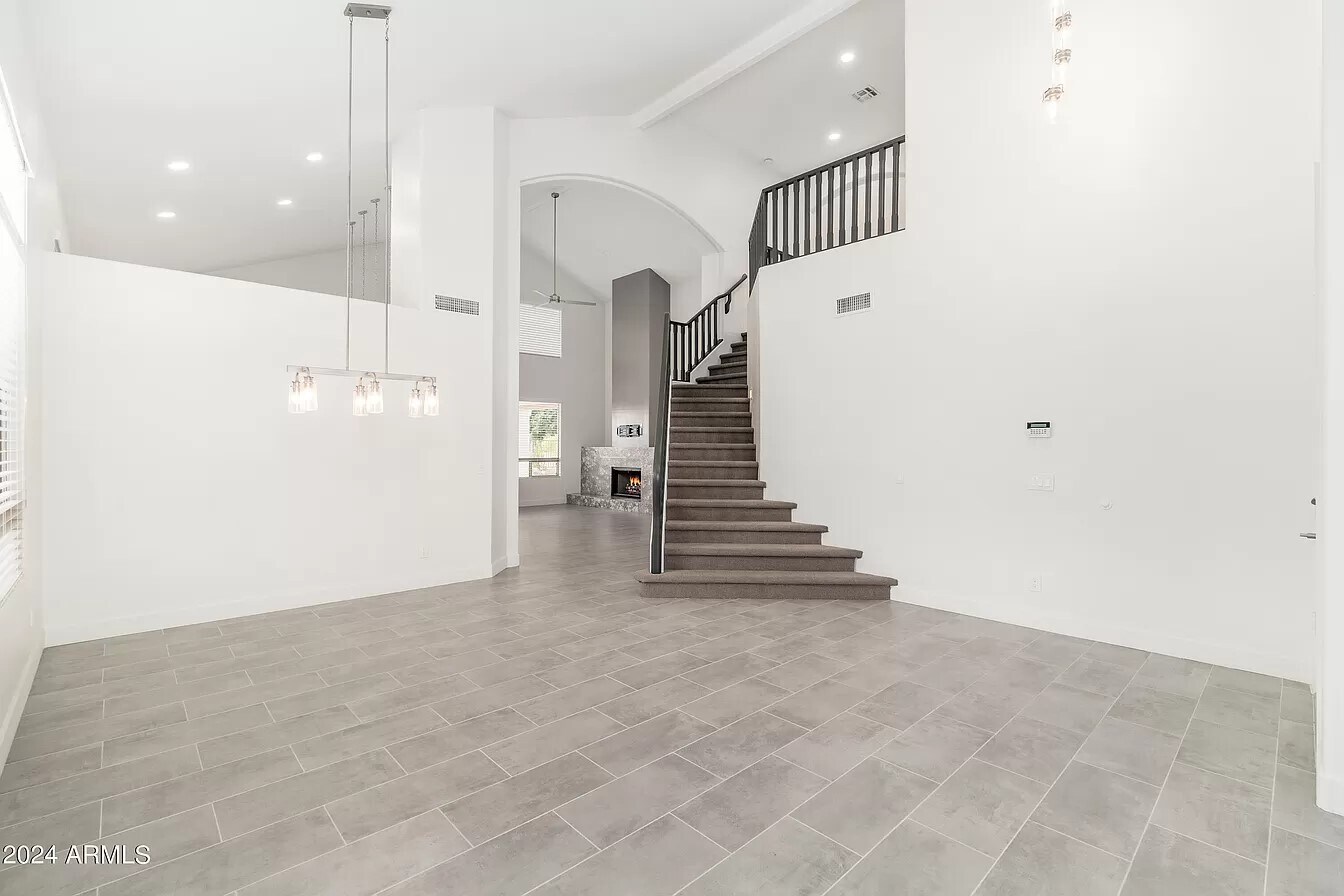 Entrance with staircase - 6739 E Gelding Dr