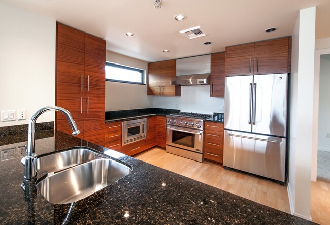 Building Photo - Spacious Luxury Riverfront Condo Near NW 23rd! Parking, Storage, Most Utilities Included!