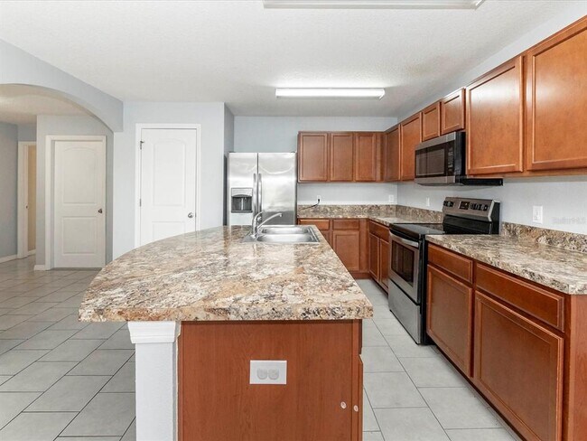 Building Photo - 5555 Maggiore Blvd