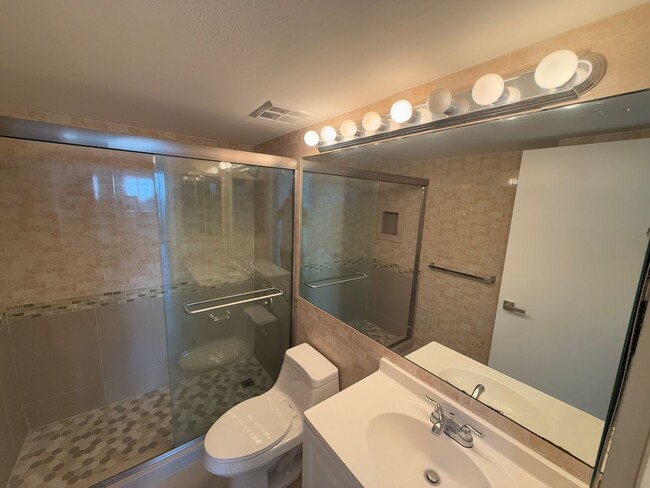 Building Photo - Steps from the beach, this remodeled 2-bed...