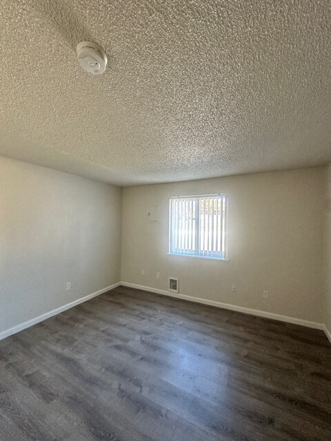 Building Photo - 2-Bedroom, First Floor Corner Unit with Laminate Flooring