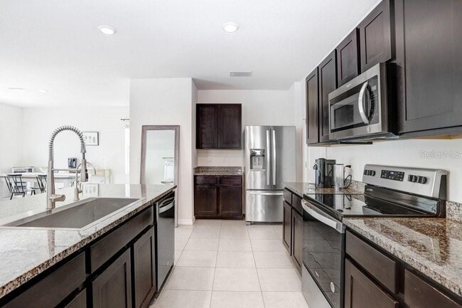 Building Photo - 3044 Suncoast Plains Dr