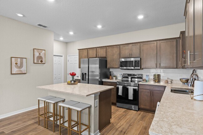 Building Photo - 3BR Center Lake Townhome | 2-Car Garage, Loft & Resort-Style Amenities
