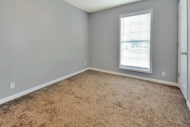 Building Photo - Pet Friendly Three Bedroom with Bonus!