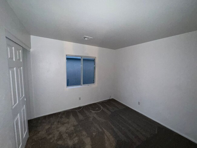 Building Photo - Fresh Paint/New Flooring all inside! Four ...