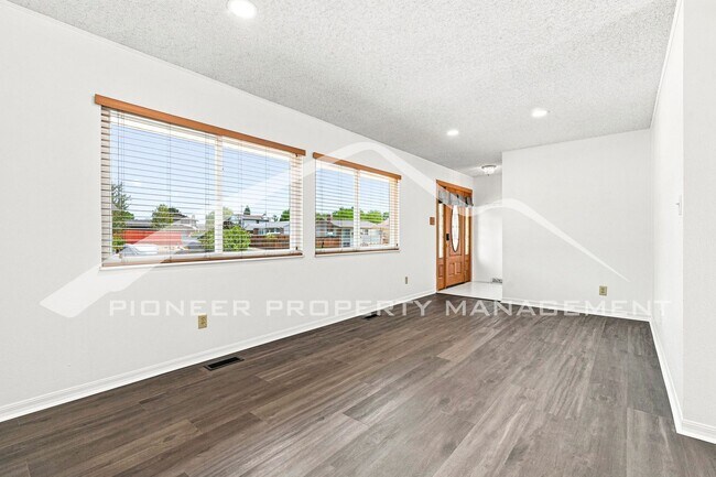 Building Photo - Spacious Home with Central AC and Traditional Wood Features