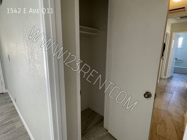 Building Photo - 1542 E Ave Q11