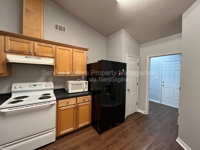 Building Photo - 4742 Spencer Oaks Blvd