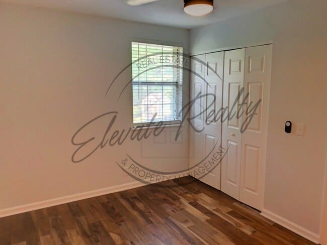 Building Photo - Stylishly Renovated Four Bedroom Home in H...