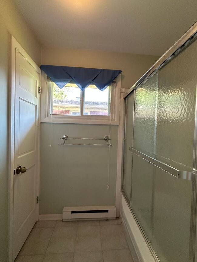 Building Photo - Not Your Typical Rental — Warm, Welcoming 3BR Brick Ranch in a Prime Neighborhood
