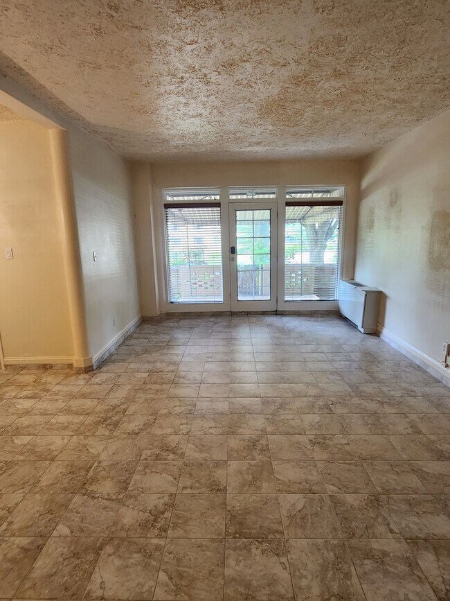 Living Room looking out to patio - 3901 Cathedral Ave NW