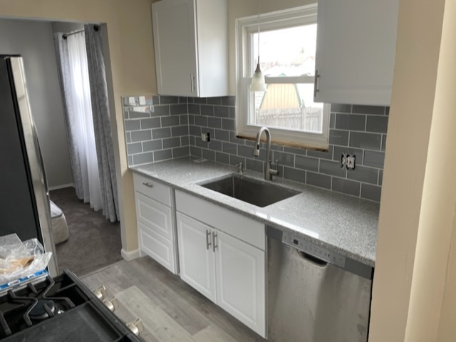 New counters and backsplash - 888 Pelley Dr