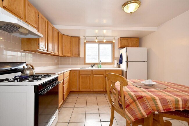 Large Eat-In Kitchen - 4044 N Mango Ave