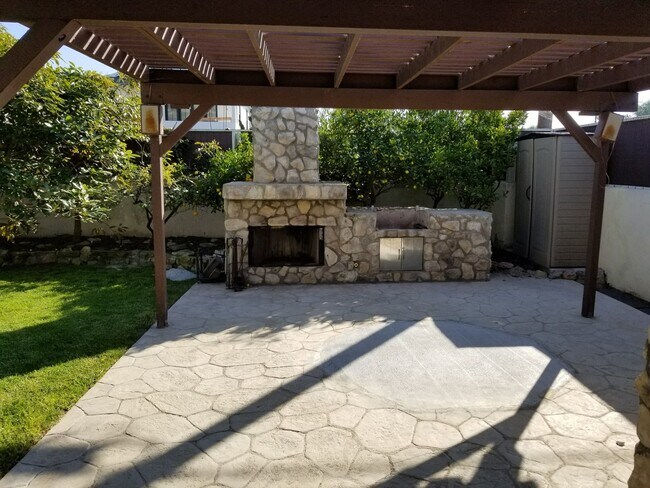 Building Photo - Three Bedroom Home + Detached Studio