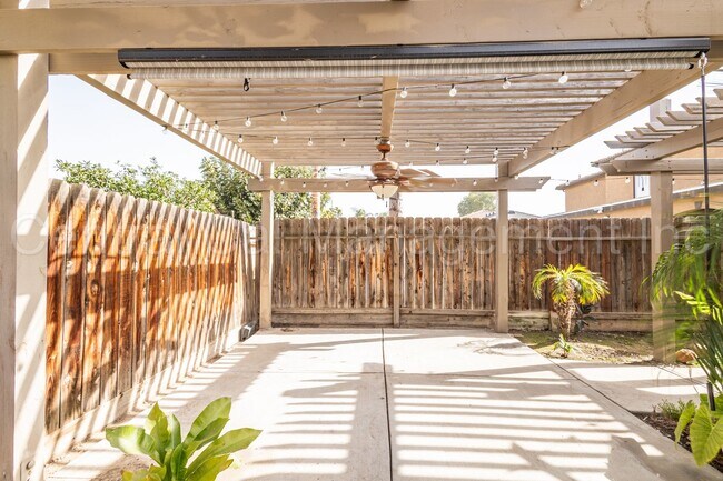 Building Photo - 3 Bedroom/2 Bath with a Pool and Solar - $...