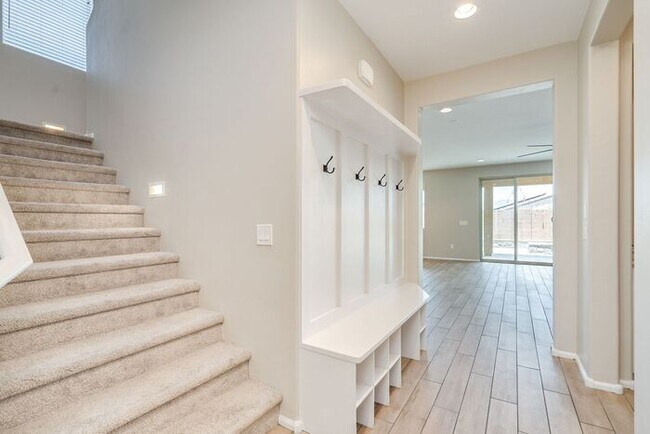 Building Photo - Amazing 4BR 2.5BA Home w/ 3-Car Tandem Garage • Pool Access • Yard w/ Fire Pit in Saguaro Trails