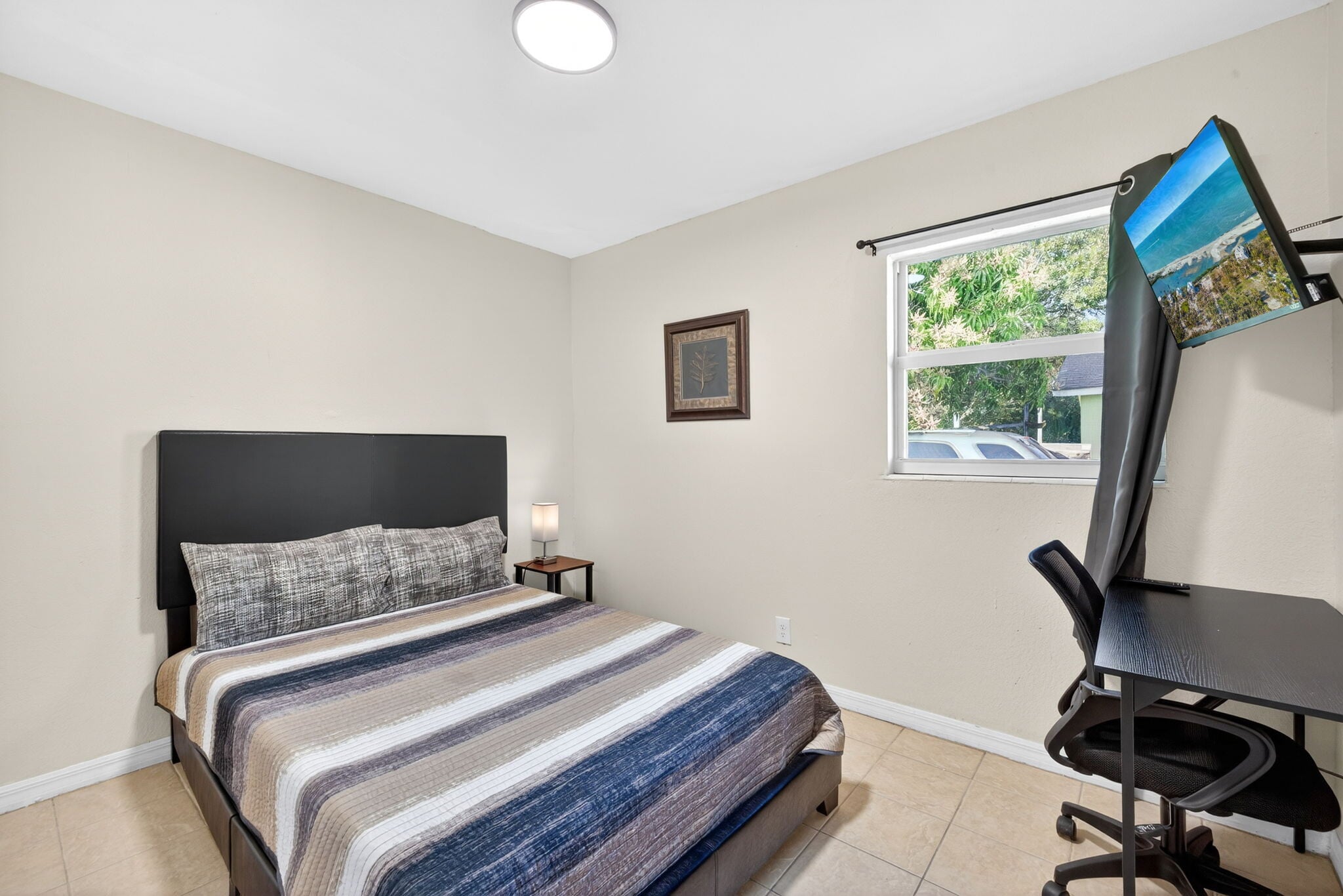 Furnished bedroom wall mounted Smart TV - 1778 Aquarius Ct