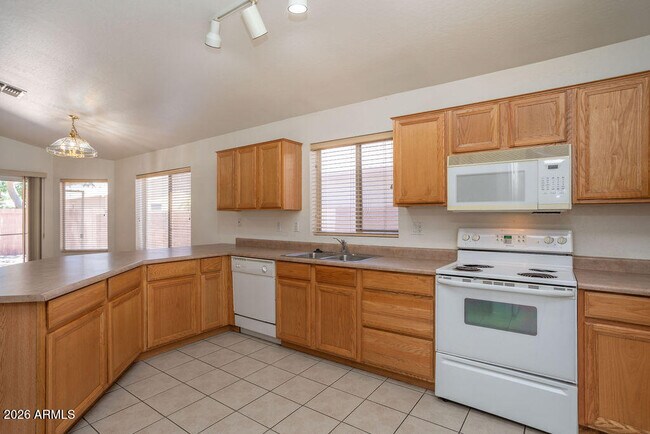 Building Photo - 6762 W Del Mar Ln
