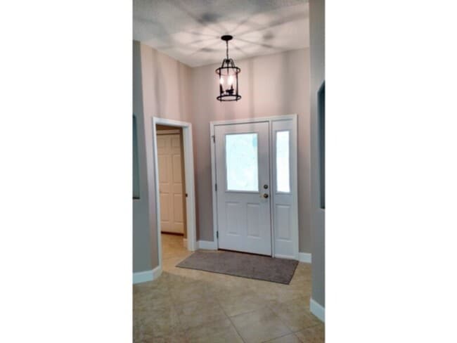 Building Photo - Updated 3/2/2 House in Palm Coast, FL.    www.WeRentSunshine.com