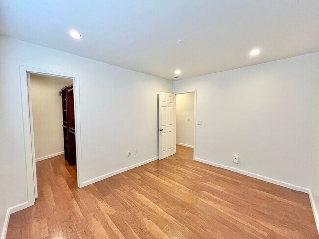 Building Photo - 4BR/3BA Large House - Single Story, No Carpet, AC, Washer/Dryer in Unit, Small Yard, 2 Car Garage...