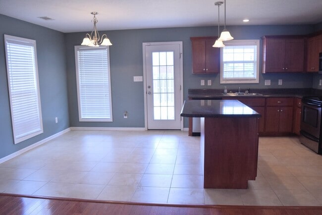 Building Photo - You've Found It! Split floor plan, fenced yard, extra storage