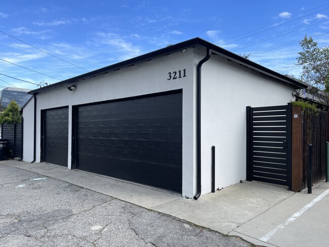 Remote app access to open garage door and secured gated entrance with perimeter security cameras - 3211 W Alameda Ave