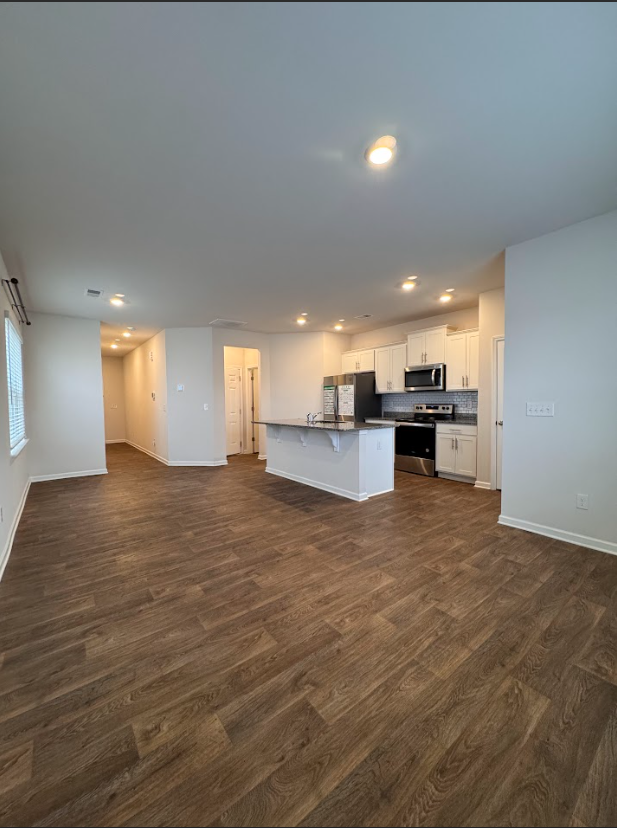 Building Photo - Stylish 3-Bedroom Townhome with Modern Ame...