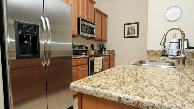 Building Photo - 8980 Majesty Palm Rd