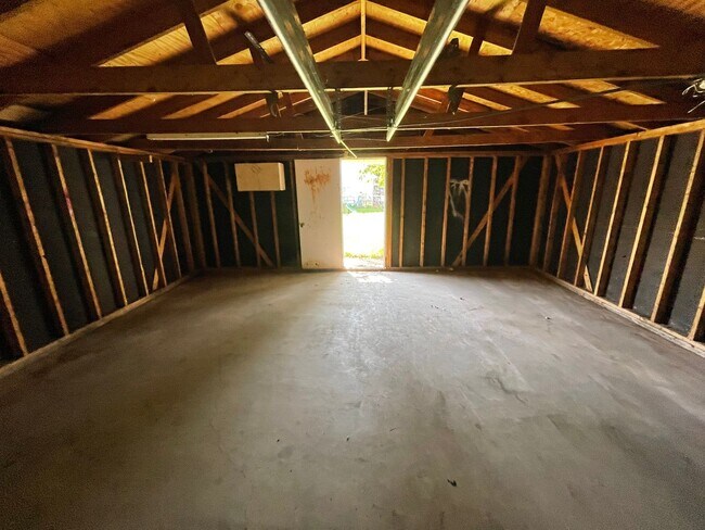 Building Photo - Interested in a two-bedroom house that includes a large garage. Please let us know