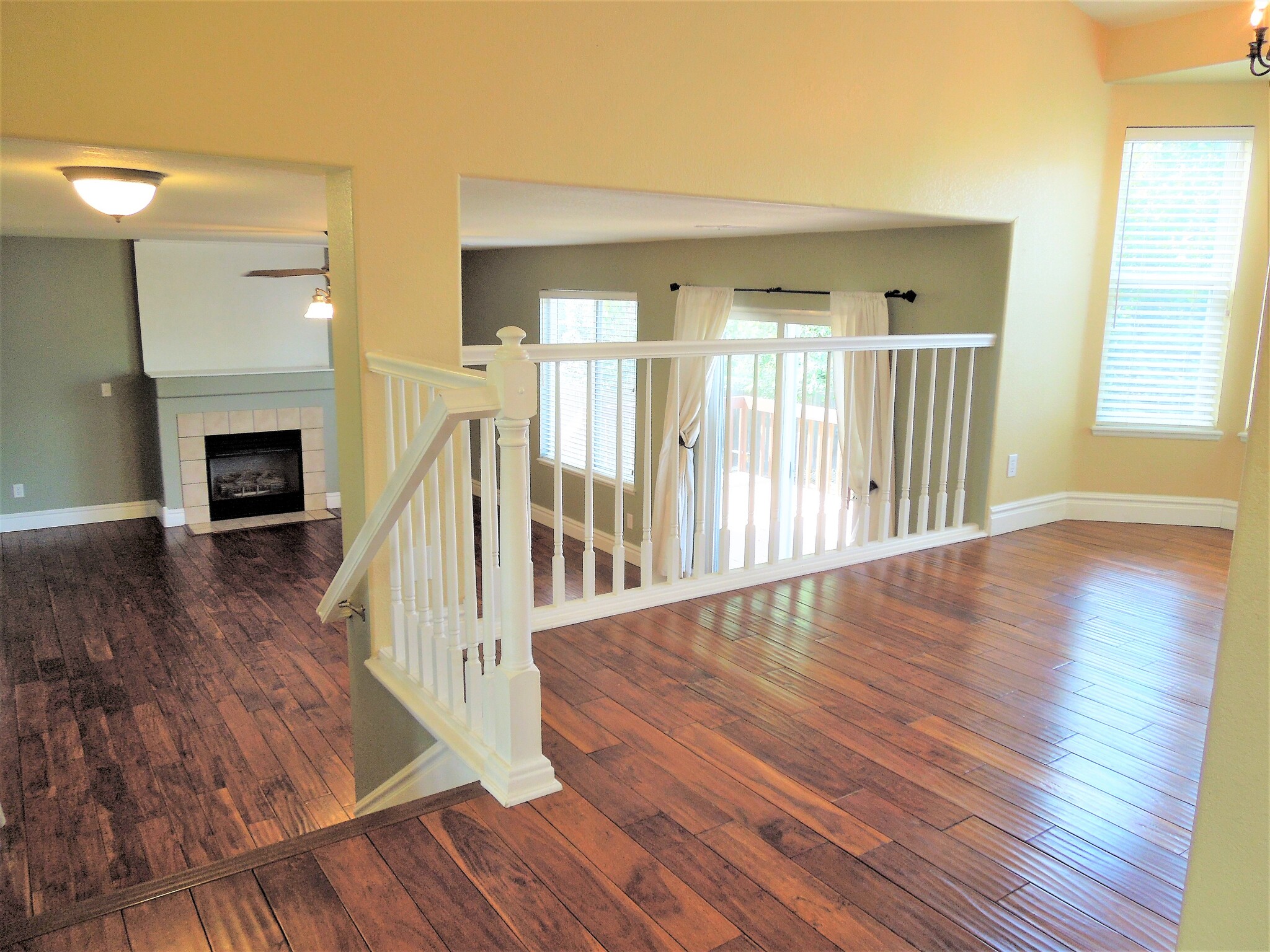Main floor overlooking cozy family room with gas fireplace - 16441 Martingale Dr