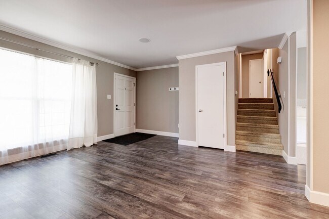 Building Photo - Spacious 4-Bedroom Home with Private Backyard and Solar Savings – Prime Location!