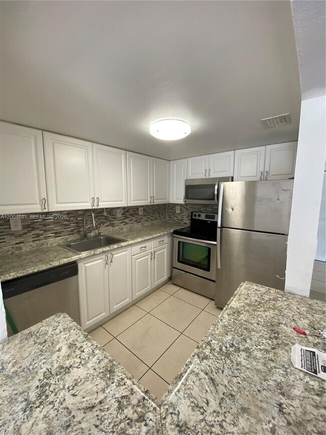 Building Photo - 17600 NW 68th Ave