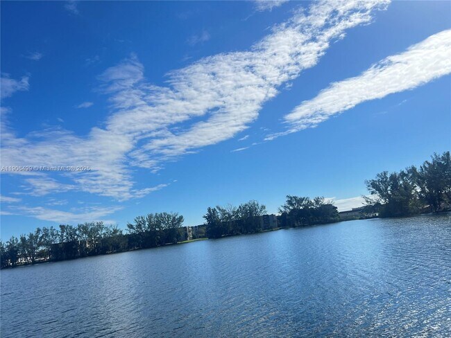 Building Photo - 9911 W Okeechobee Rd