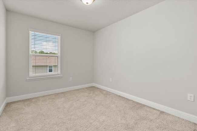 Building Photo - HEART OF DAPHNE TOWNHOUSE WITH GARAGE