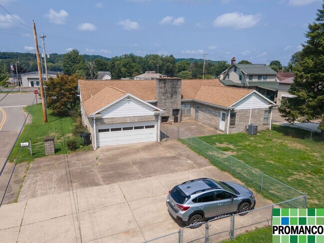 Building Photo - Discover the Perfect Blend of Residential ...