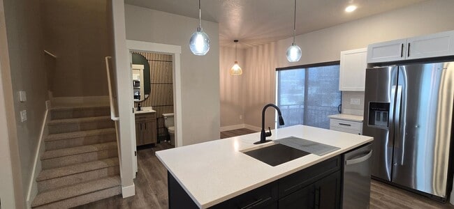 Building Photo - Come check out this beautiful 3 story town...