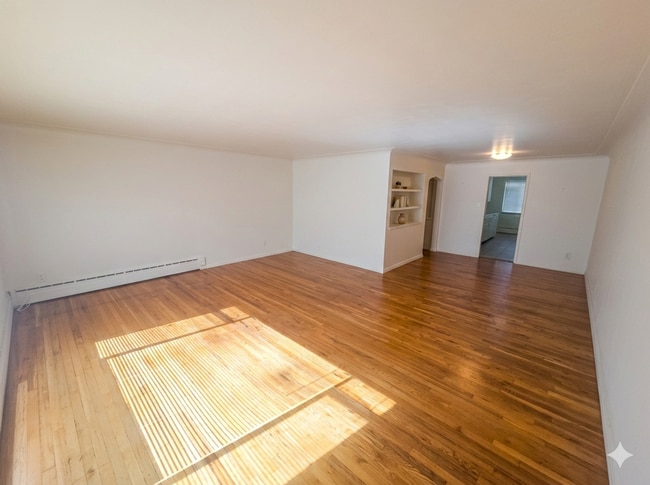 Building Photo - Spacious 2 Bedroom with Large Living Room and Separate Dining Area – Over 1,100 Sq Ft