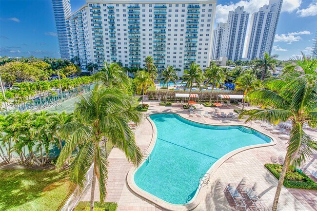 Building Photo - 19380 Collins Ave