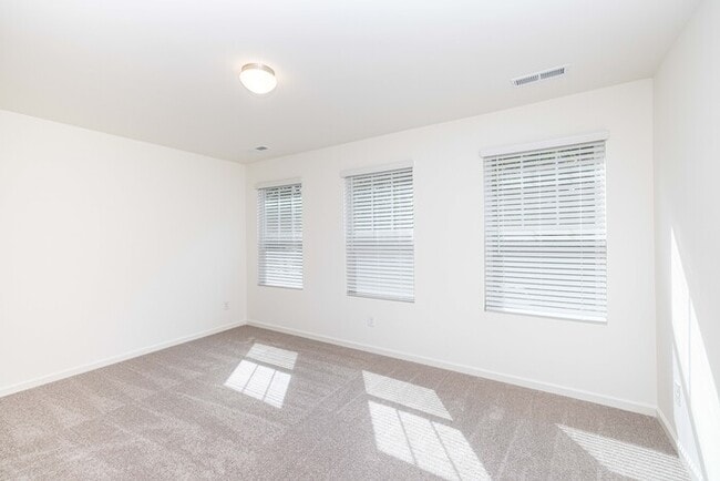 Building Photo - Beautiful 3 Bedroom Townhome Main Street Downtown Pineville - MOVE IN READY