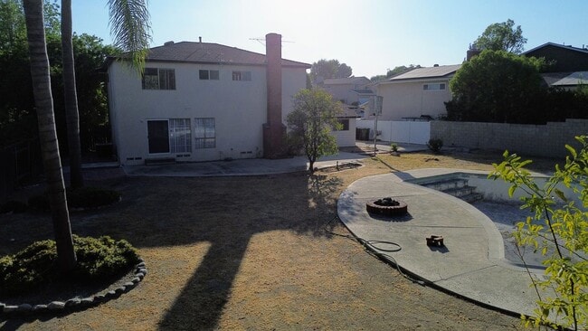 Building Photo - Beautiful 5BR/4BA Home with Large Yard & P...