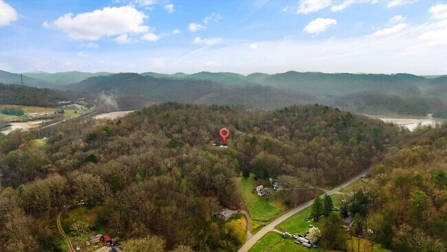 Building Photo - Harriman 37748 - Charming 2-bedroom, 1.5-bathroom Home nestled on 3.8 acres of woods - Contact Ch...
